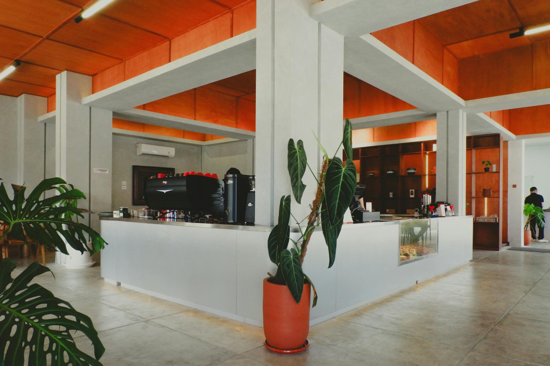 A stylish cafe interior with modern and industrial design elements in Jawa Barat, Indonesia.